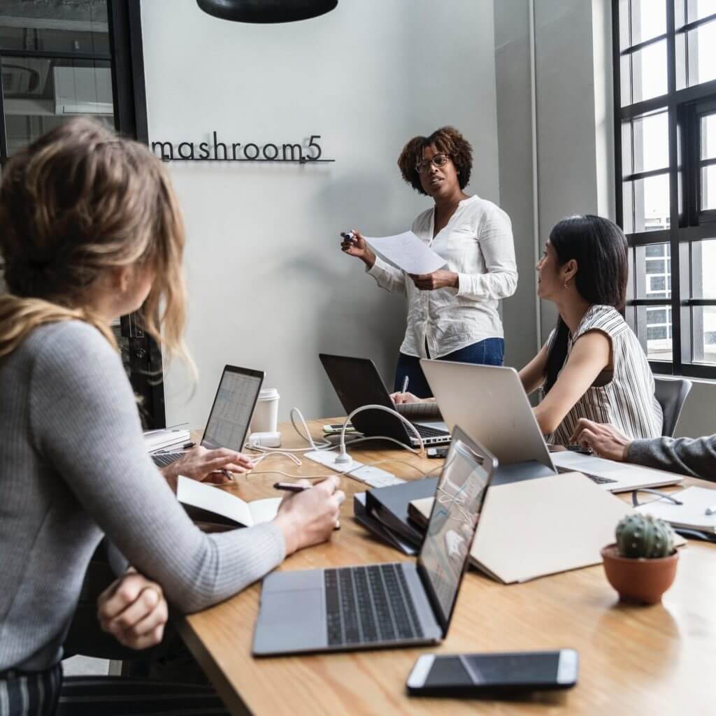 Team sitting at a conference table